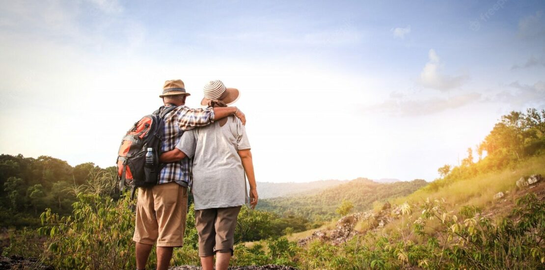 Staffords Wealth Management photo of a couple looking over valleys showing if you give yourself peace of mind with a personalised retirement plan. Staffords can show you how they specialise in solutions that protect your assets, allowing you to enjoy your retirement and provide for future generations.