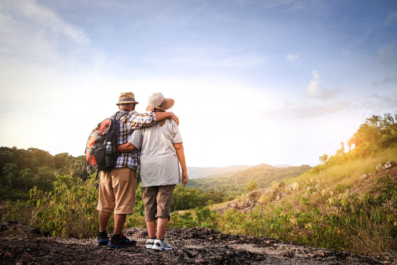 Staffords Wealth Management photo of a couple looking over valleys showing if you give yourself peace of mind with a personalised retirement plan. Staffords can show you how they specialise in solutions that protect your assets, allowing you to enjoy your retirement and provide for future generations.