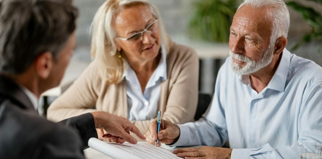 Staffords Wealth Management photo explaining to a couple about Estate Planning Strategies and how it helps you to provide for the future of your loved ones and ensures your assets are preserved for future generations, according to your wishes.