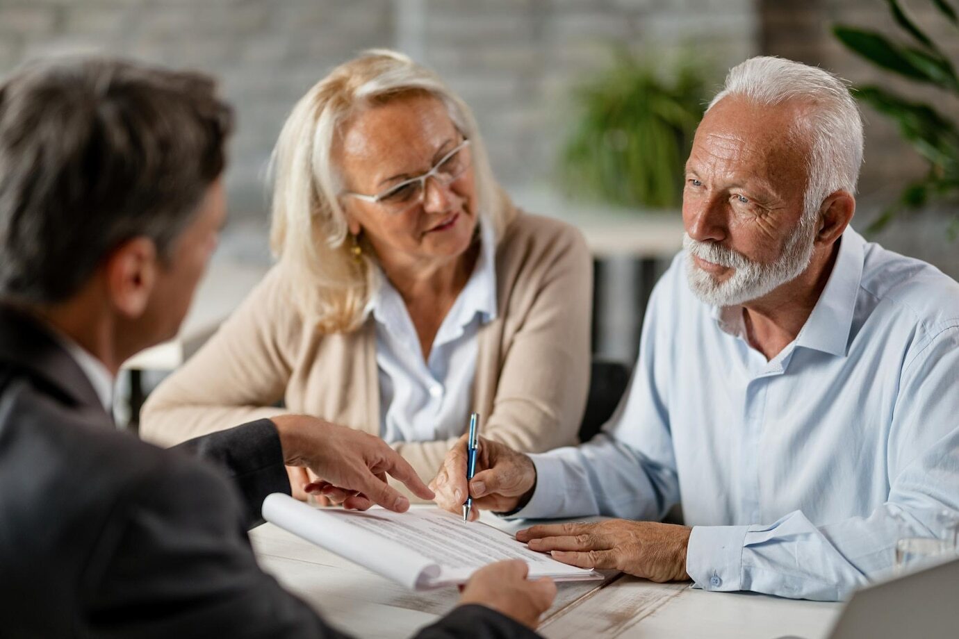 Staffords Wealth Management photo explaining to a couple about Estate Planning Strategies and how it helps you to provide for the future of your loved ones and ensures your assets are preserved for future generations, according to your wishes.