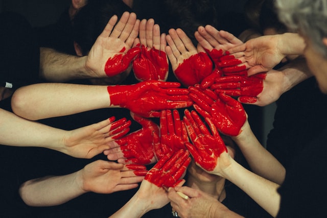Staffords Wealth Management photo of hands forming a medium surface with palms with a paited heart across all hands symbolising the Gift Trust offers a flexible, simple, tax-smart service to help you meet your charitable giving goals. Staffords provides an initial consultation to discuss how it works and see if The Gift Trust is right for you.