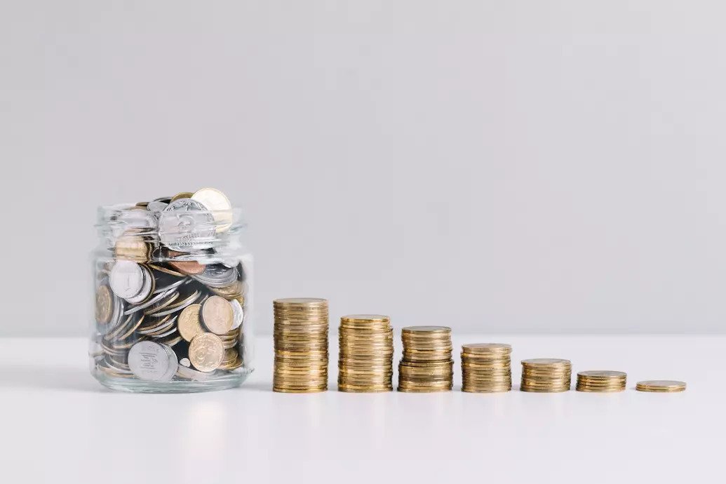 Staffords Wealth Management photo of coins in a jar and piled up coins beside it symbolising Wealth creation and wealth protection being very different concepts, requiring a different set of skills. If you have recently sold a farm or business, it can be daunting to know what to do next! We can help you protect your capital for retirement or succession.